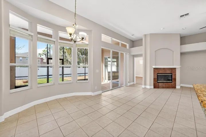 Looking out to the Screened Porch and Living Area from Kitchen