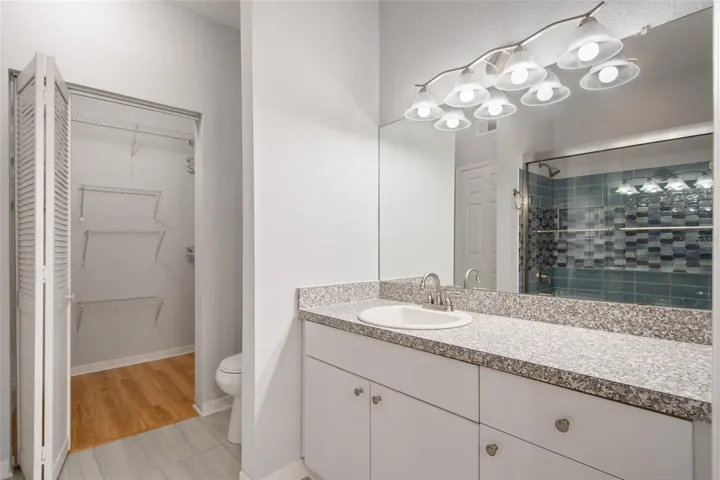 Bathroom and walk in closet.