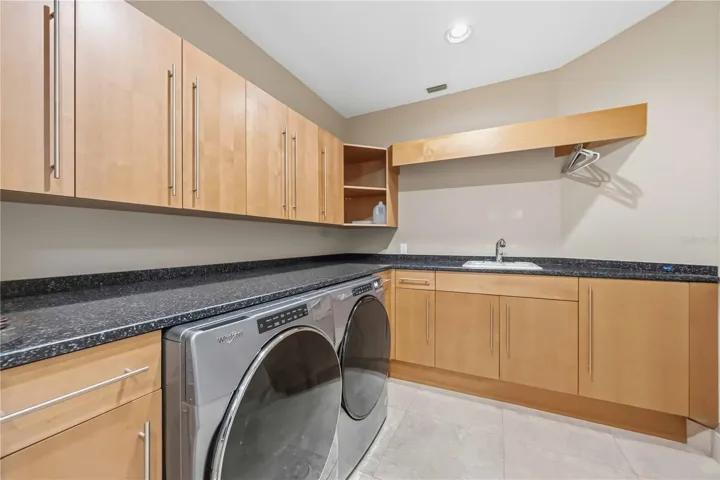 Laundry room with sink