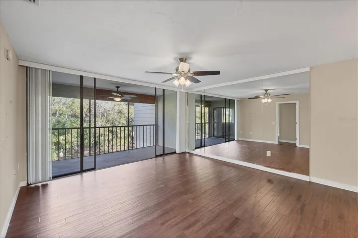 Living room w/ large sliders to covered lanai