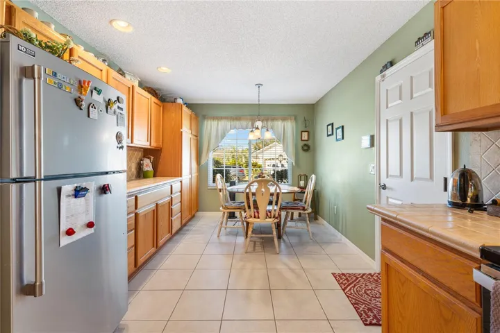 Eat in kitchen with Stain Steel Appliances.