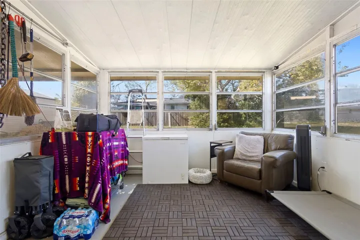 View of patio with large windows.