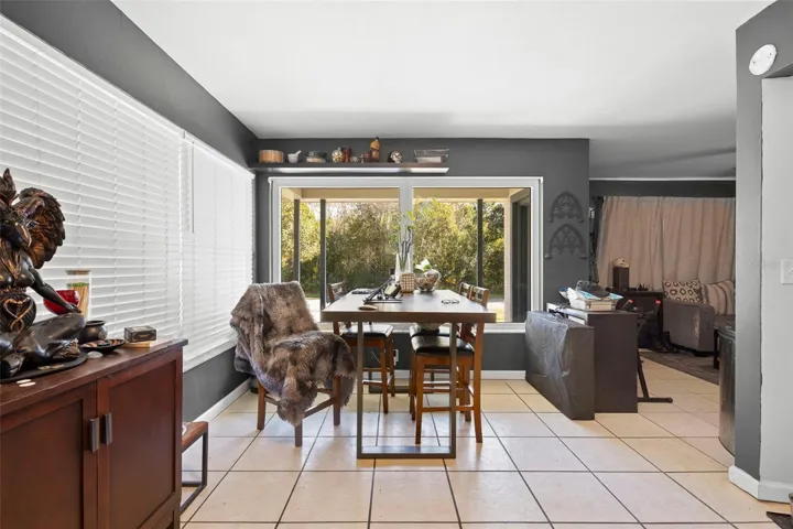 View of dining area and entrance toward living room.