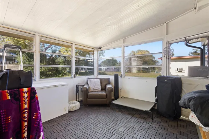View of enclosed patio from dining area.