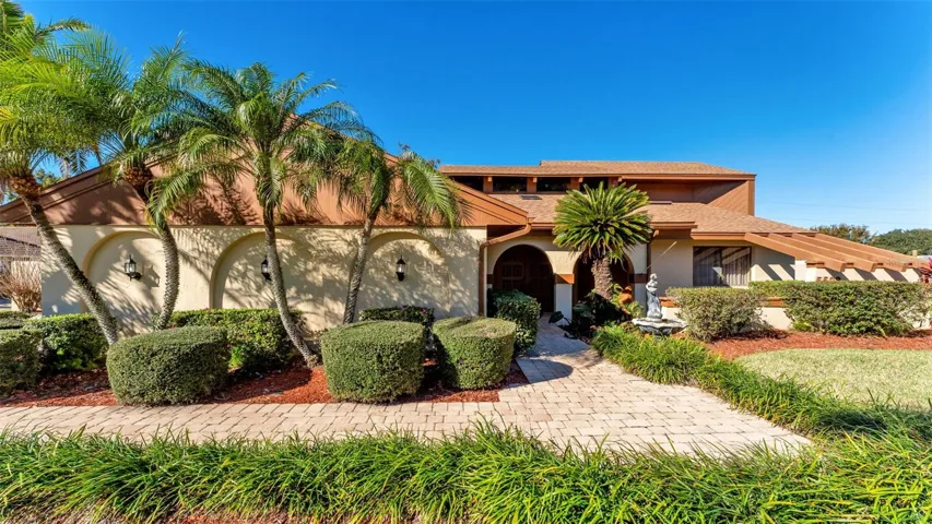 Beautifully landscaped with pavers front view