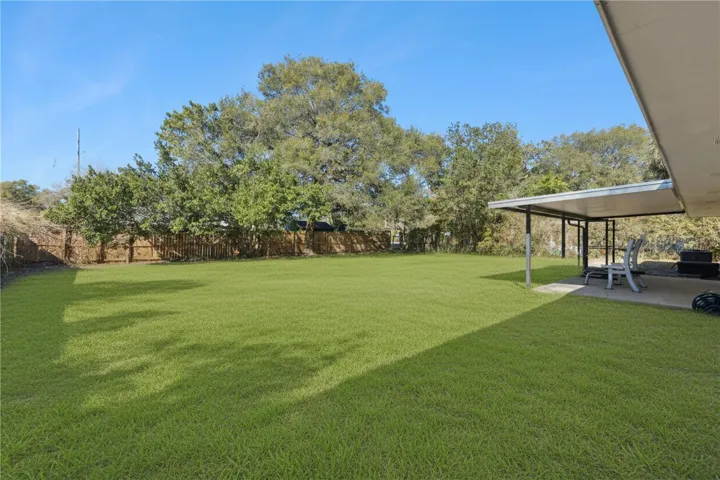 Large backyard, private and completely fenced in