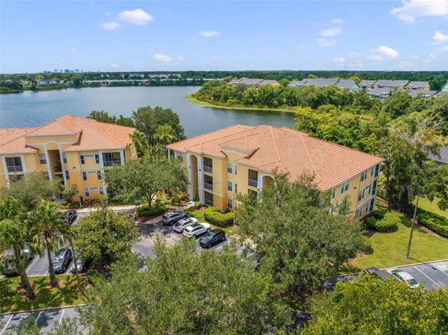 Welcome to Visconti, a ~ GATED ~ WATERFRONT COMMUNITY ~ where stylish living meets everyday convenience in the heart of Maitland!