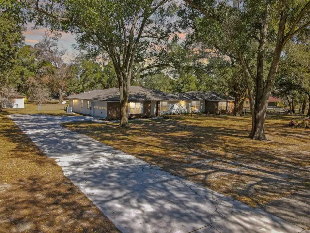 Driveway so Long you Could Land a Plane!  |Every day, You will Enjoy the Endless Square Feet of Bright, Commercial-Grade Porcelain TILE, All THREE Expertly Re-Modeled BATHROOMS, the Custom Master Closet Built-ins, and Quality Kitchen Appliances including TWO Built-In Convection Ovens and a Huge Sub-Zero Refrigeration and another Separate Sub-Zero Freezer as well! You Will LOVE it!