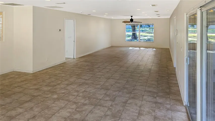 48 Foot Long MASTER BEDROOM, View #1 | •#1500 Square Foot MASTER SUITE Addition is LARGER than most other People’s Homes. You have to SEE it to Believe it…Boasting a 48 foot Long, 18 foot Wide Bedroom with loaded with Sun-Drenched Windows…a 16 foot long, Triple-Reinforced Master Closet that Doubles as a Hurricane Safe Room…and also a 30 Foot long, Three-Sinks Master Bath with a Tripled-Headed Walk-in Shower Nicer & BIGGER than many Gyms and Professional Spas!