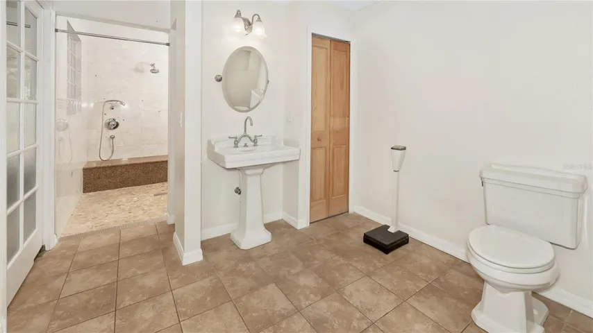 Huge Walk-in Shower So Large it has it's own Entrance Foyer with a THIRD Sink!