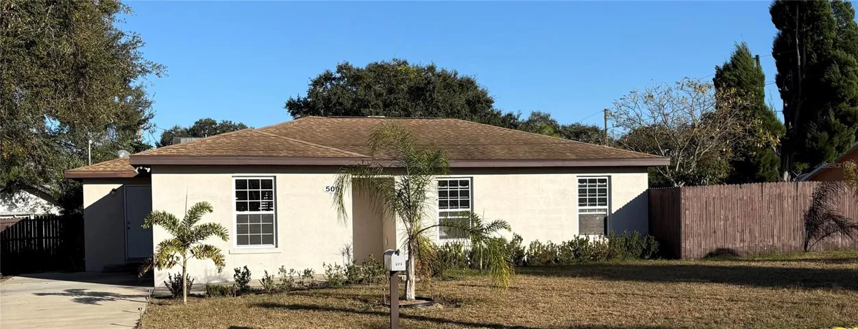 Front of home, faces west