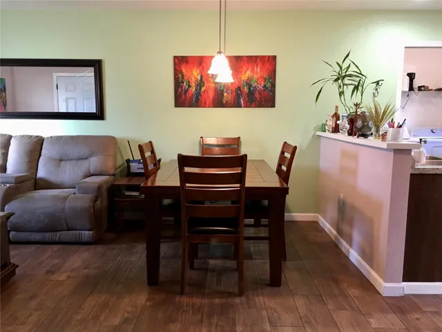 Dining area between kitchen and living room