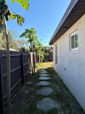Path from kitchen door to backyard area