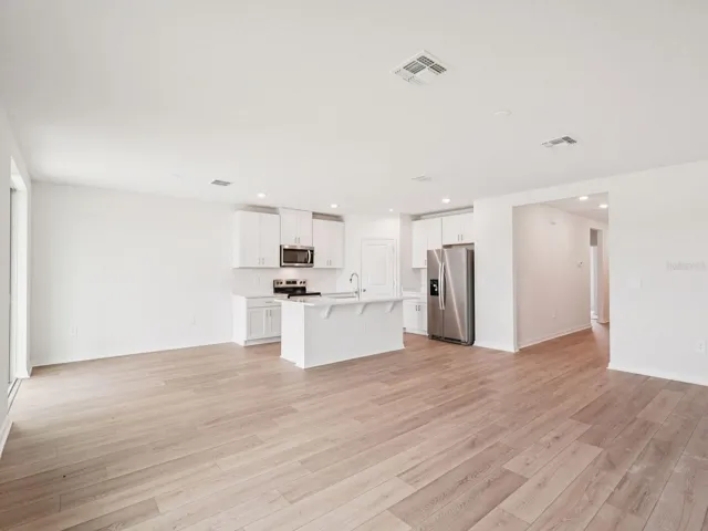 Photos are not of the actual home, but are photos of the builder home with same floorplan with similar interior finishes.