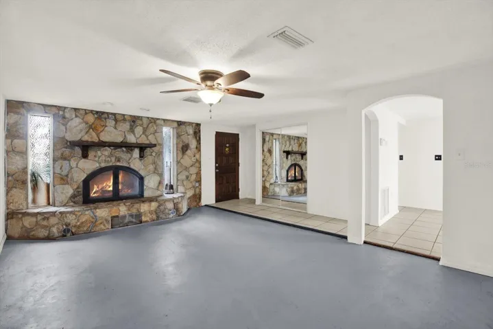 Welcoming to your large living room with fireplace