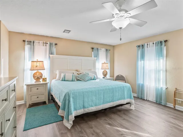 Large primary bedroom , is an escape for restful sleep.