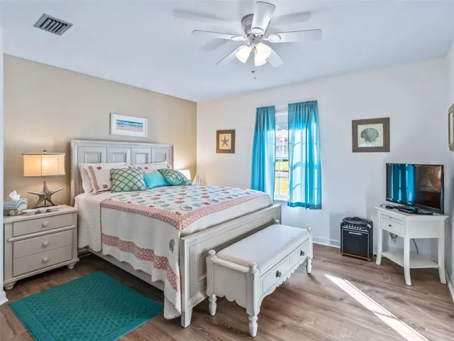 Your guest will not want to leave this pretty second bedroom