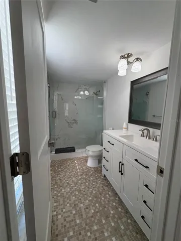 Updated bathroom with walk in shower