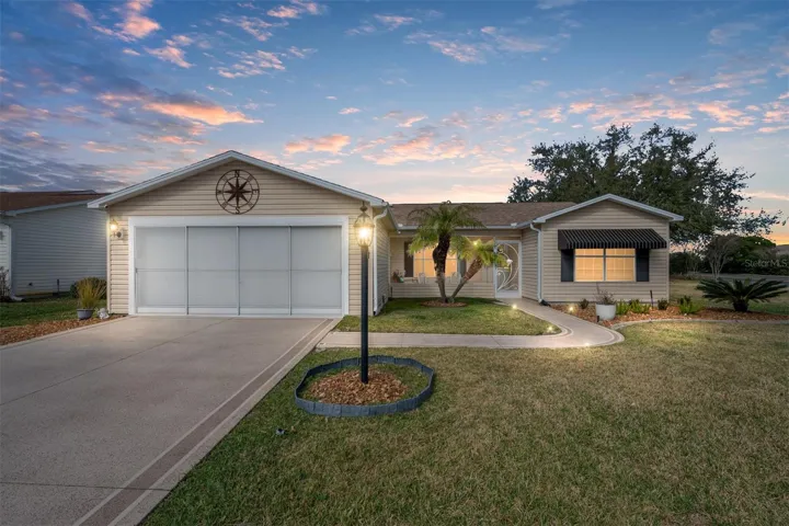 FRONT EXTERIOR at Dusk (Virtually Simulated) - 2001 Cipriano Place, The Villages, FL 32162
