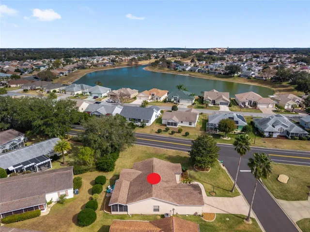 AERIAL looking EAST - highlighting the close proximity to the US 441 Commercial Corridor (runs deep left to right) and Hacienda Hills Championship GC (center)