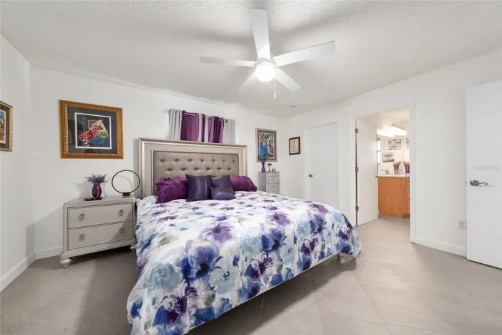 PRIMARY BEDROOM - Open door leads to ENSUITE BATHROOM