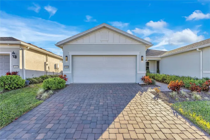 Modern villa with paver driveway!