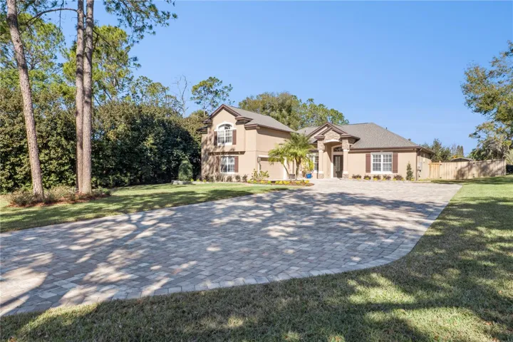 Spacious 4 Bedroom/3.5 Bath/2 Car Garage/Screened-In Pool/Spa and Fully Fenced-In Backyard