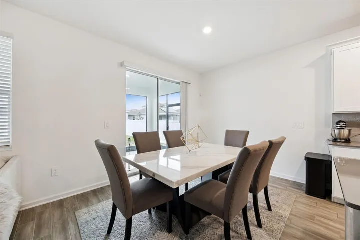 Kitchenette and slider out to the Covered Lanai