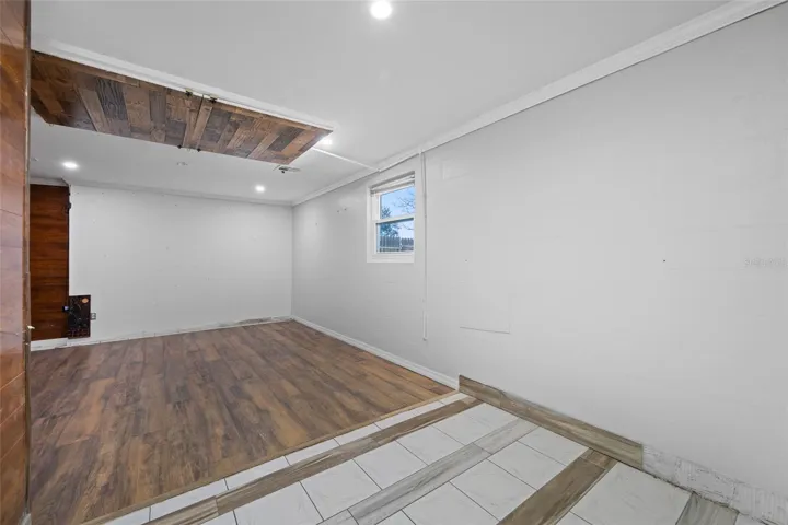Primary Bedroom with Full Bath via Converted Garage.