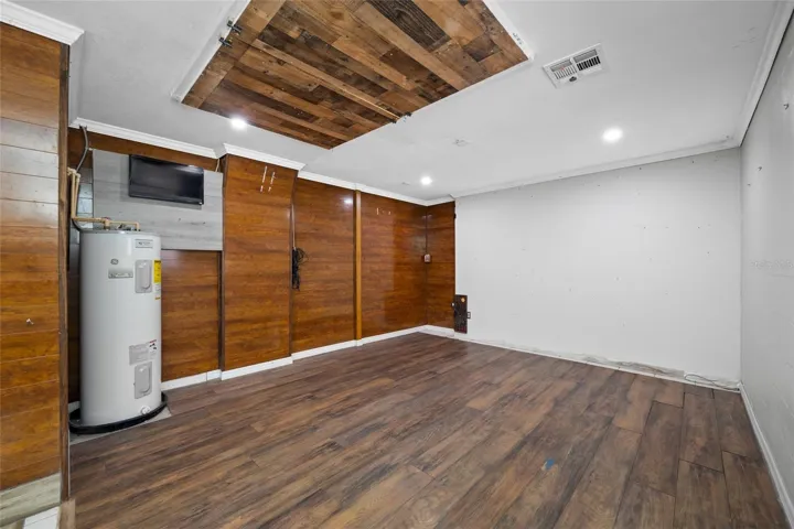 Primary Bedroom with Full Bath via Converted Garage.