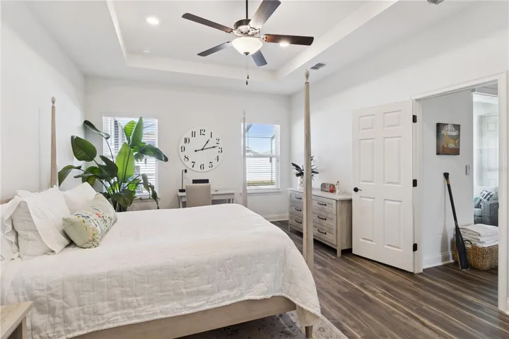 Primary bedroom with tray ceiling