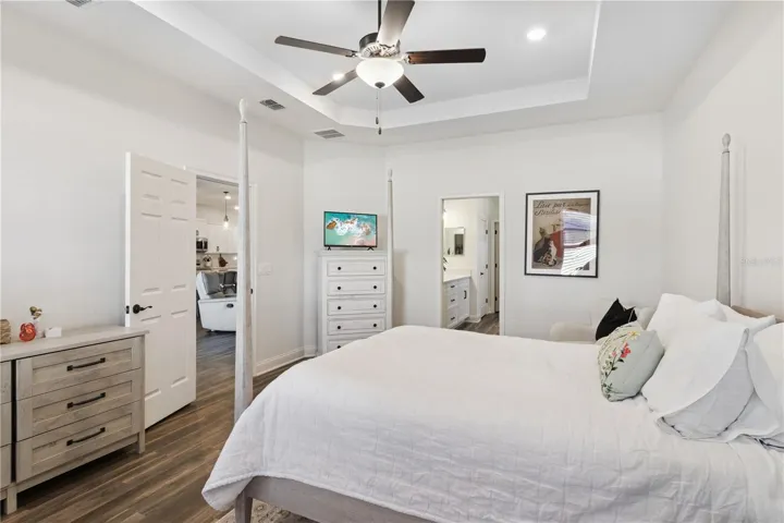 Primary bedroom with tray ceiling