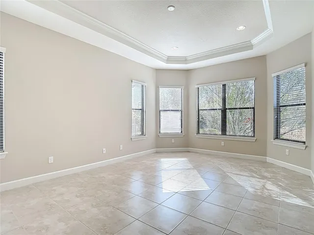 Primary BR with crown molding & tray ceiling