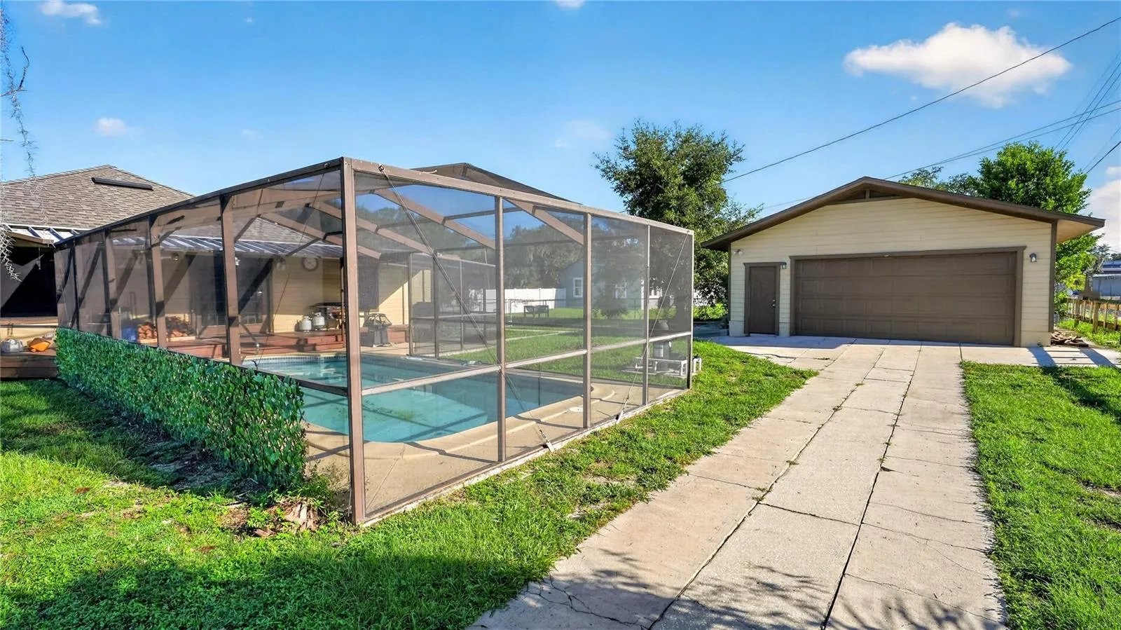 Driveway with Garage and Pool