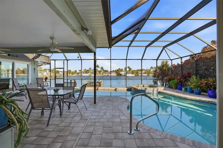 Patio Oasis Caged Pool/Spa overlooking water