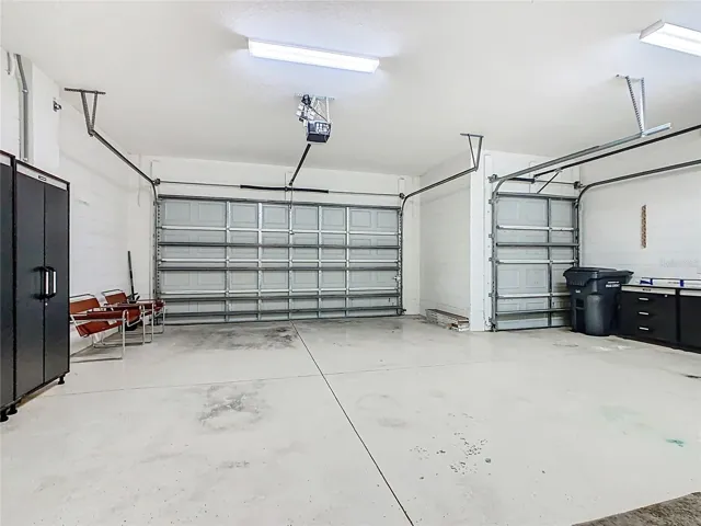 TWO CAR GARAGE WITH GOLF CART BAY