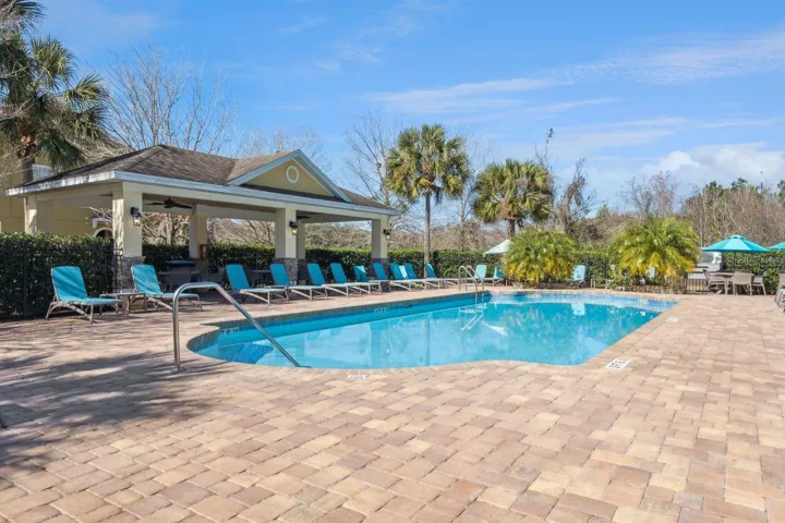 Resort Style Pool with Large Cabana and green area