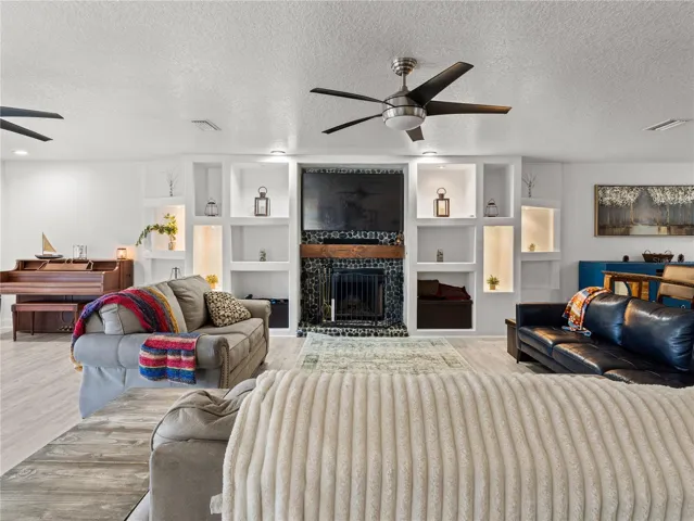 GREAT ROOM AND WOOD BURNING FIREPLACE