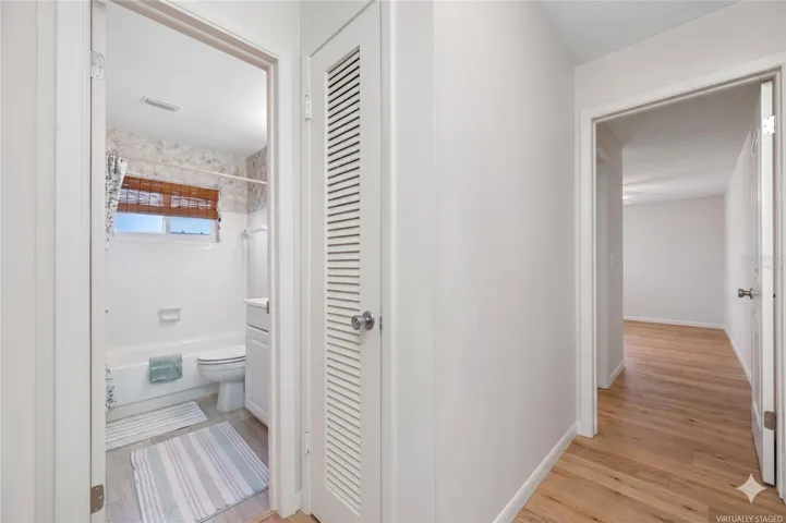 Virtually staged to represent flooring allowance offered by seller