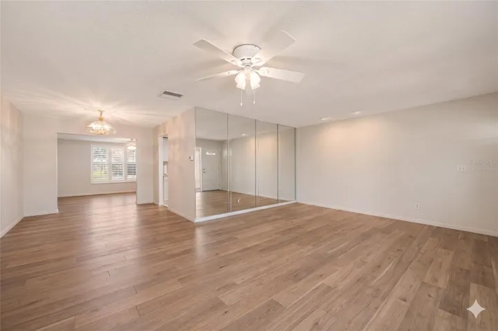 Virtually staged to represent flooring allowance offered by seller