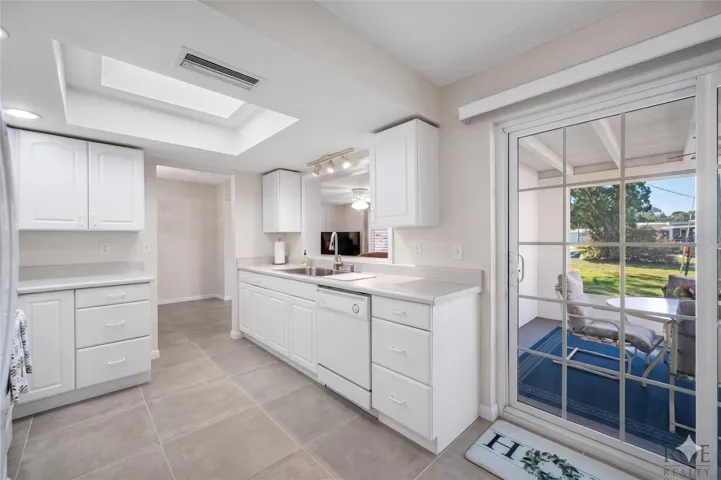 Virtually staged to represent flooring allowance offered by seller