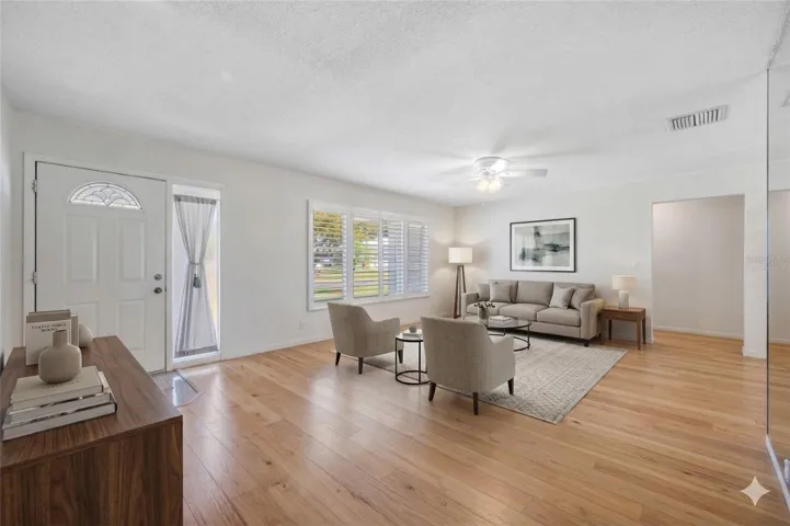 Virtually staged to represent flooring allowance offered by seller