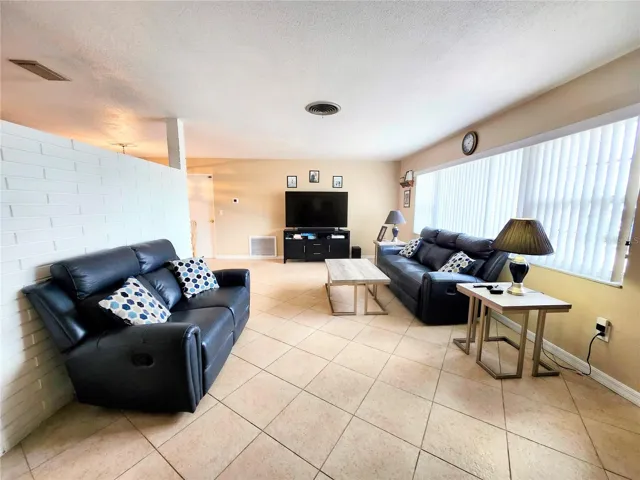 Bright, open layout with new hurricane windows & doors