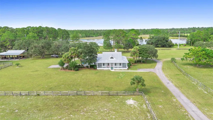 Aerial of house and driveway.