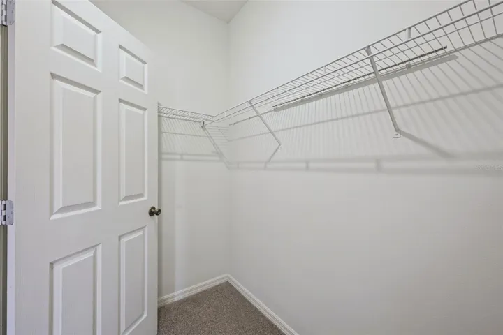 Primary Bed ClosetWalk-in closet