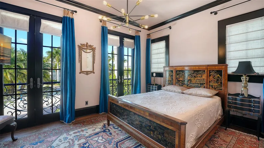 Guest suite with dramatic floor-to-ceiling windows