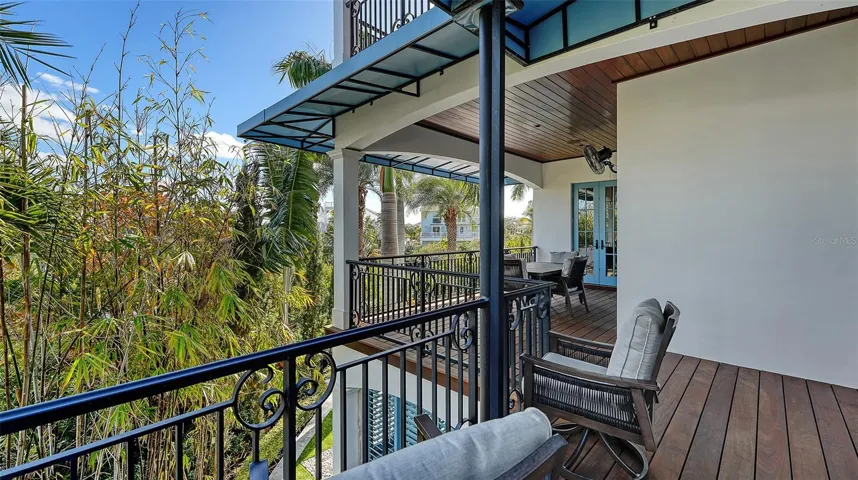 Private balcony surrounded by tropical greenery