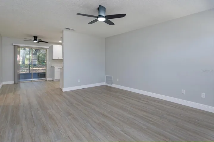 Living Room with view to eat-in kitchen 54-