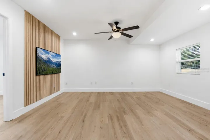 Virtually staged TV. TV wall mount installed and conveys