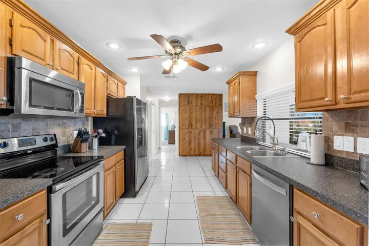 Galley Kitchen  Stainless Appliances 9'10